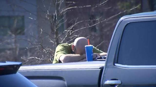 Dexter Tart prays during rescue operation