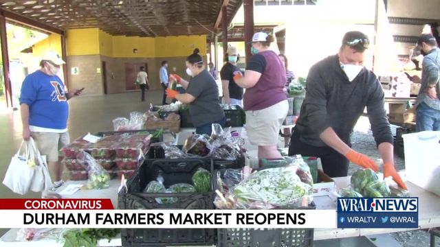 People flock, practice social distancing as Durham Farmer's Market reopens