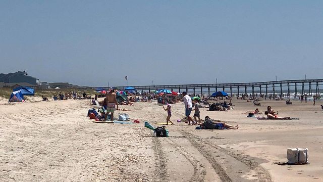 Drone video shows heavy crowds at Ocean Isle Beach on Sunday