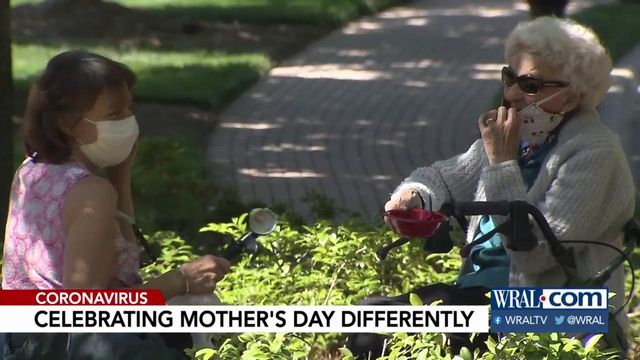 Mother, daughter celebrate Mother's Day with masks while social distancing
