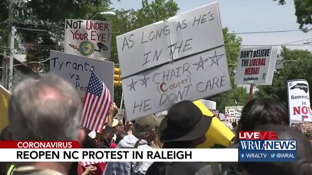 ReOpen NC protesters gather, plane carries counter protest message overhead
