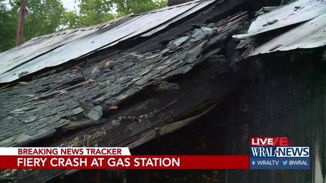 Car crash causes massive fire at gas station