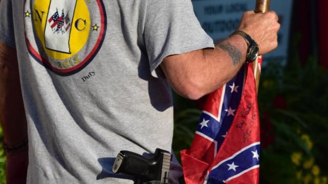 Man seen wearing ACTBAC t-shirt, an organization with ties to hate groups according to the SPLC
