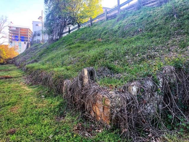The stone wall has corners that indicate where rooms or doors may have been.