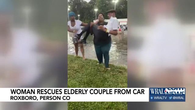 Woman who rescued elderly couple trapped on flooded road shares story