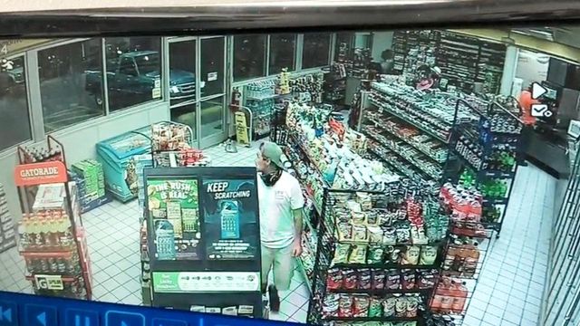 Surveillance video shows moments before gas station shooting