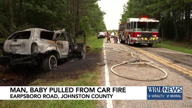 Man and baby pulled from car fire