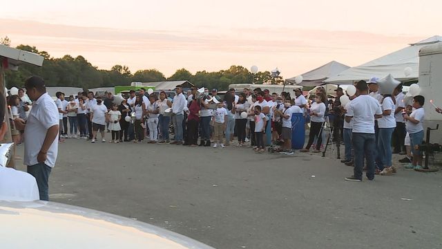 Vigil held for for two siblings washed away in Smithfield floodwaters