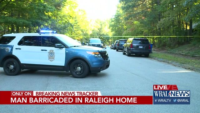 Raleigh police say man barricaded in home now in custody