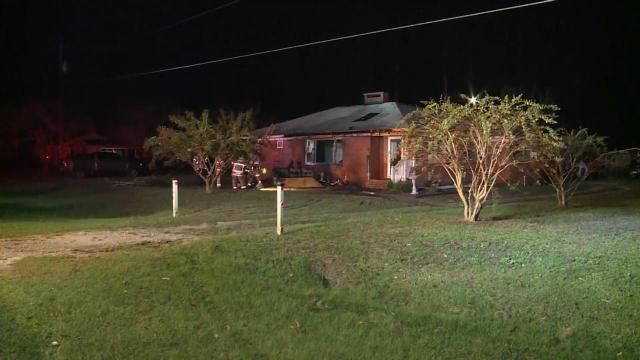 Car crashes into Fayetteville home, starting fire