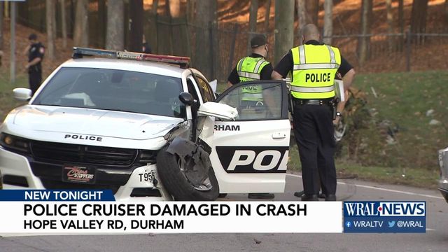 Police cruiser damaged, another car ran off road in Durham
