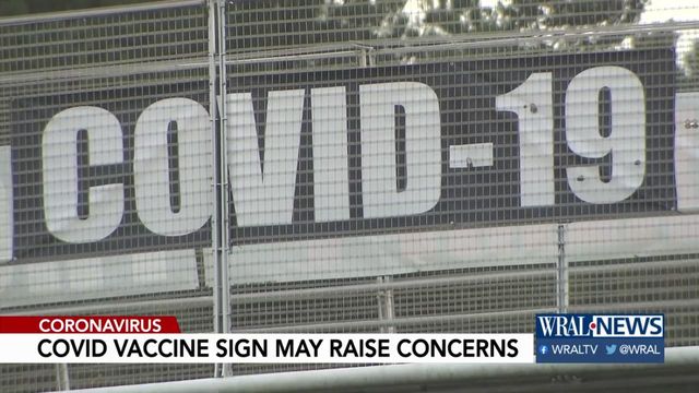Health expert: Sign over I-40 may raise concern about COVID vaccine
