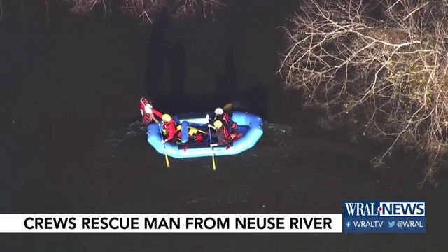 Crews rescue man, dog from Neuse River