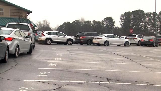Cars line up at 4:30 a.m. for drive-thru vaccine clinic