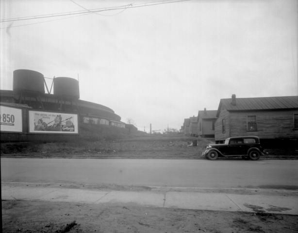 Part of the Smoky Hollow neighborhood in 1948, with the Seaboard Station train roundhouse visible in the background. Courtesy of the State Archives of North Carolina.