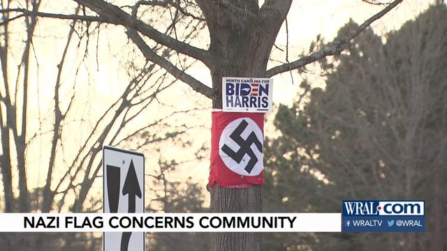 Wake County community outraged by Nazi flag posted below 'Biden Harris' sign