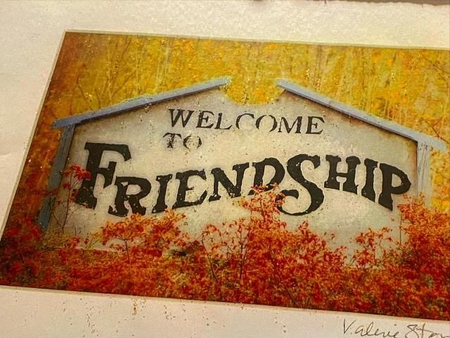 Photo of the 'Welcome to Friendship' sign by Val Stone Creager of Val Stone Photography hanging in the Vicious Fishes Brewery in Friendship, NC. Photo credit: Val Stone Photography
