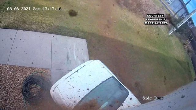 Caught on cam: Car smashes into martial arts school
