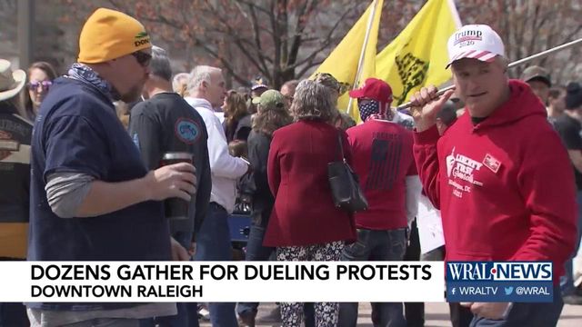 Nearly 100 people gather for dueling protests in downtown Raleigh 
