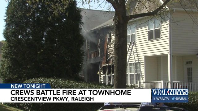 Fire blazes at Raleigh townhouse near Tryon Road