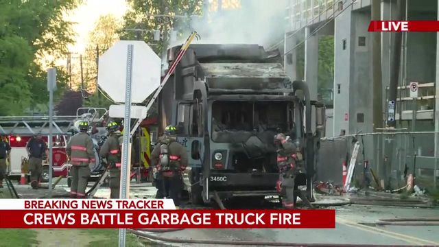 Crews battle garbage truck fire in Durham