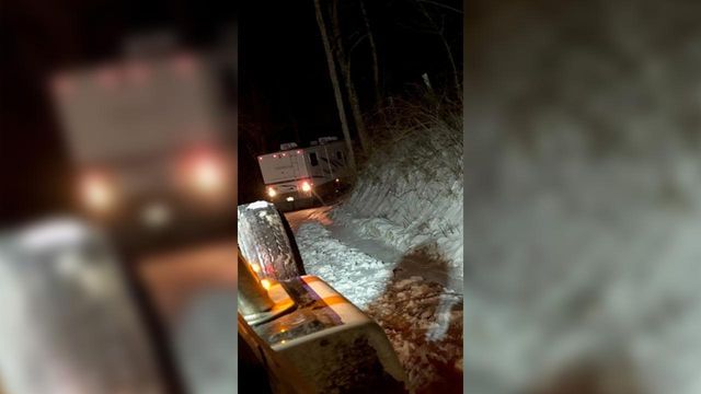 Newlyweds back up RV more than a mile down an icy road in NC mountains