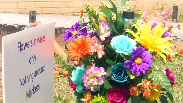 Cemetery crew tosses flowers, other items left at graves
