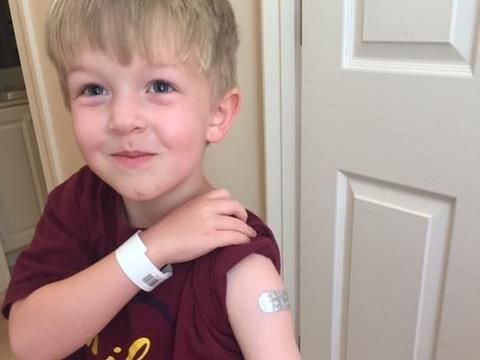 Both brothers, ages 5 and 7, got a COVID vaccine as part of a trial at Duke.