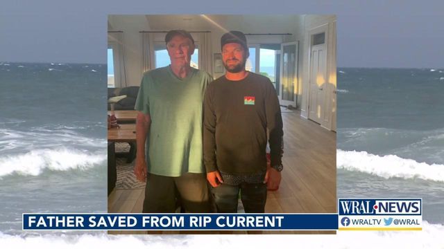 Beach worker saves grieving father from rip current