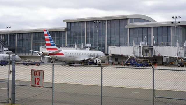 An American Eagle plane is parked and ready for boarding at the Raleigh-Durham International Airport on Memorial Day weekend. Photo taken May 30, 2021. 