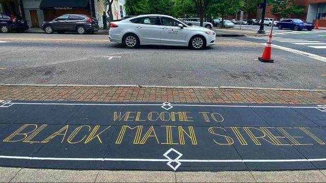 Murals on Hargett Street tell the history of Black Main Street in Raleigh.