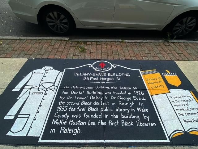 Murals on Hargett Street tell the history of Black Main Street in Raleigh.