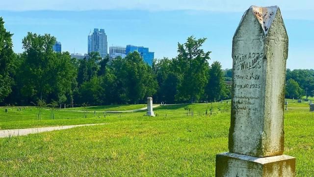 A crowd of around 50 people gathered for a walking tour of the rolling green hills of Mt. Hope Cemetery, one of Raleigh's earliest municipal African American cemeteries.