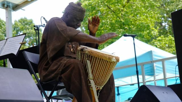Jonathan Olu-Taylor, Djembe Drummer, opens Dix Park's Juneteenth event with a song of celebration. Photo taken June 19, 2021.