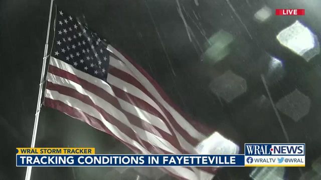 Aaron Thomas monitors Claudette as it pours in Fayetteville