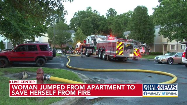 Woman jumps from second floor to escape burning apartment