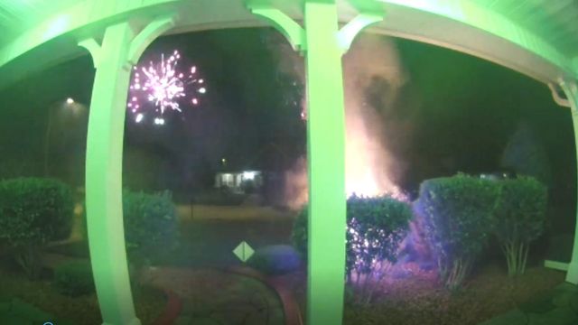 Fireworks fly into WRAL reporter's yard, causing bush to catch fire