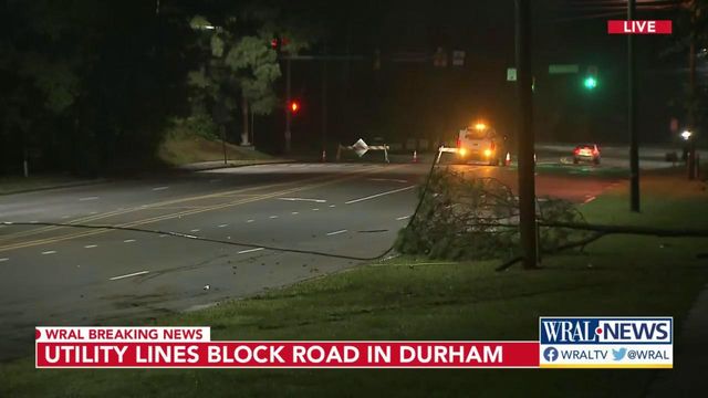 Downed power lines block Fayetteville Street in Durham
