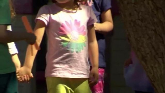 Health experts say kids should stay outside as much as possible and mask up indoors