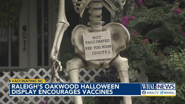 Raleigh's Oakwood Halloween display encourages vaccinations