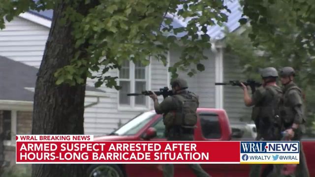 Armed man arrested after hours-long barricade situation 