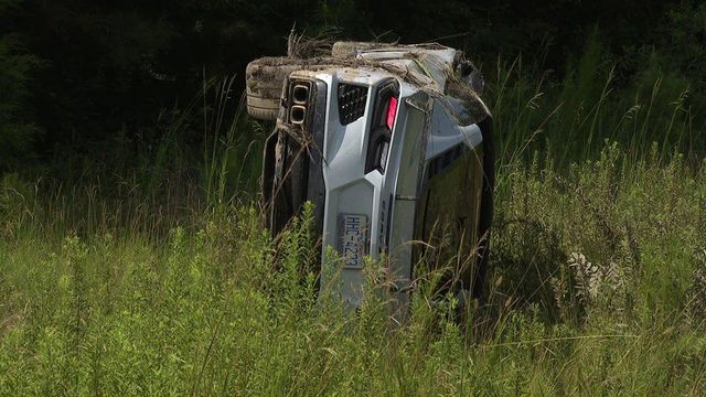 Aftermath: Corvette pulled from high weeds after high-speed crash
