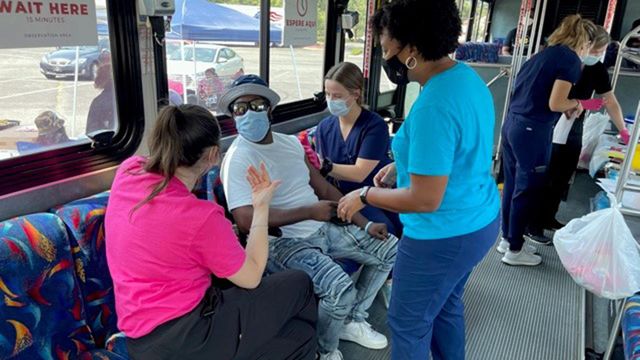 Nonprofit takes vaccination clinic into underserved community