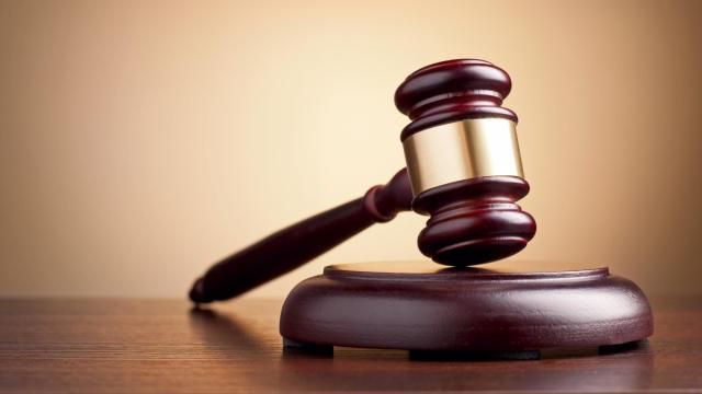Stock photo of a gavel in a courthouse. Stock photo of a gavel in a courthouse.