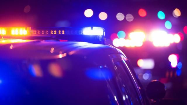 Police car and emergency vehicle lights at nighttime Police car and emergency vehicle lights at nighttime