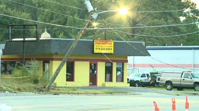 Power lines stretched across Roxboro Street in Durham