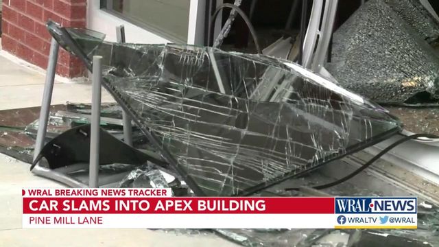 Car slams into Apex business at shopping center