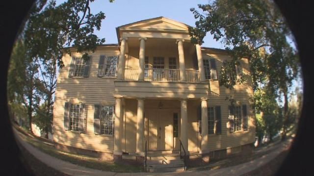 A ghostly woman appears on the balcony of the Mordecai House in Raleigh.