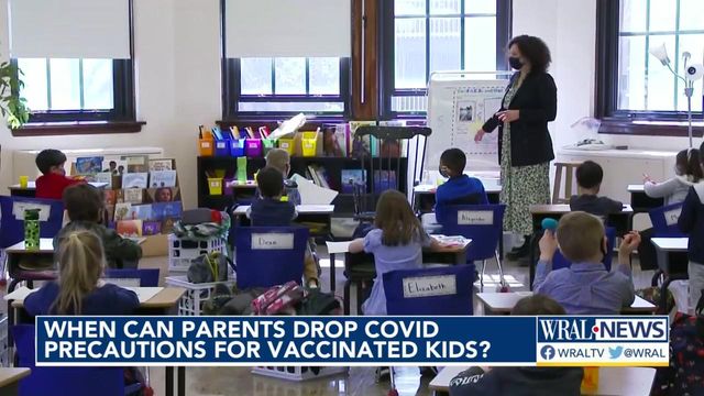 When can parents drop COVID precautions for vaccinated kids?