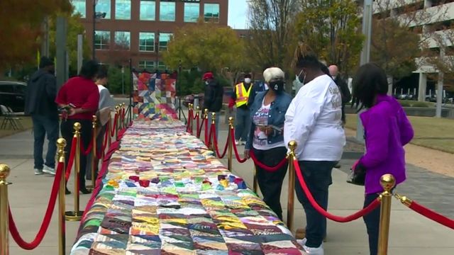70-foot-long quilt shows impact of gun violence in Durham one square at a time